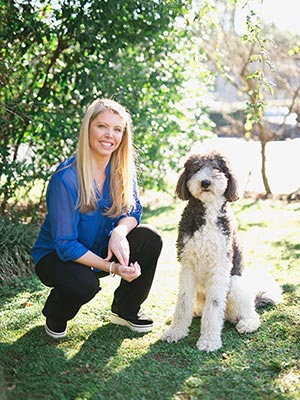 dr. becky hobbs with her dog happy